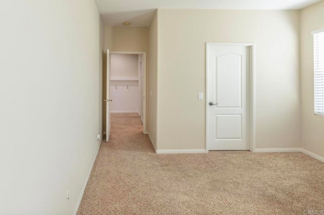 interior space featuring light colored carpet