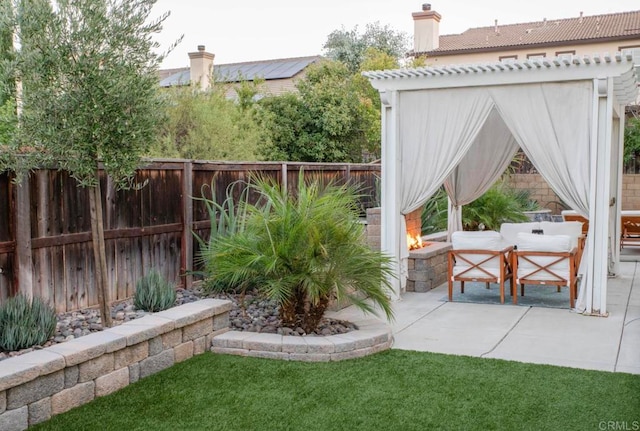 view of yard with a pergola and a patio