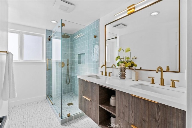 bathroom featuring vanity, tile patterned flooring, and a shower with door