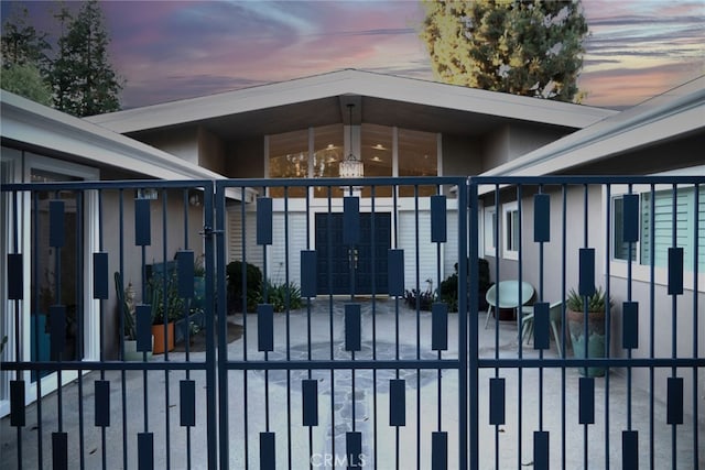 gate at dusk with fence