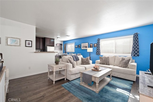 living room featuring dark wood-type flooring