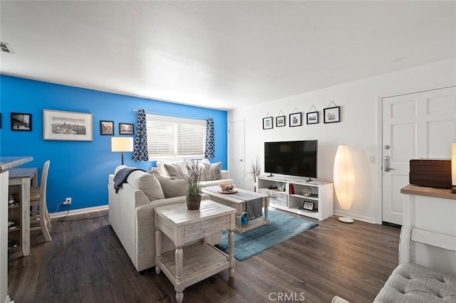 living room with dark wood-type flooring