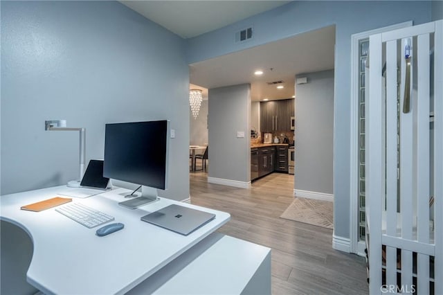 office featuring light hardwood / wood-style floors