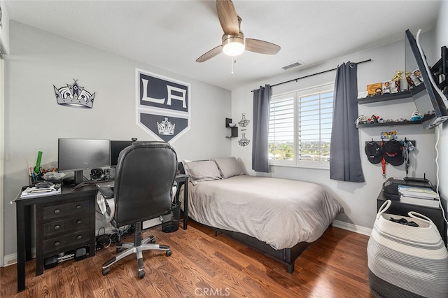 bedroom featuring ceiling fan and wood-type flooring