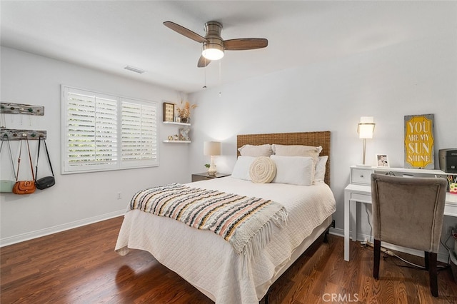 bedroom with ceiling fan and dark hardwood / wood-style floors