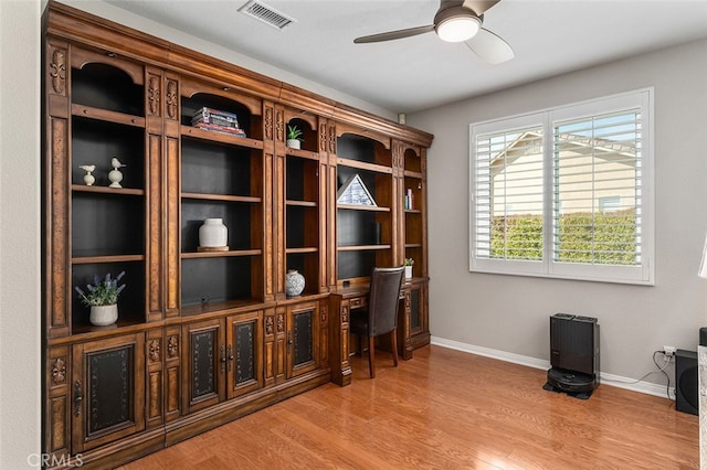 office space with ceiling fan and hardwood / wood-style floors