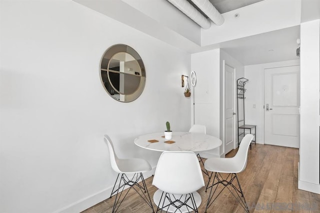 dining room featuring hardwood / wood-style flooring