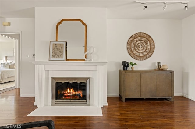 unfurnished living room featuring dark hardwood / wood-style floors