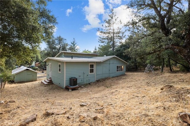 back of property featuring cooling unit