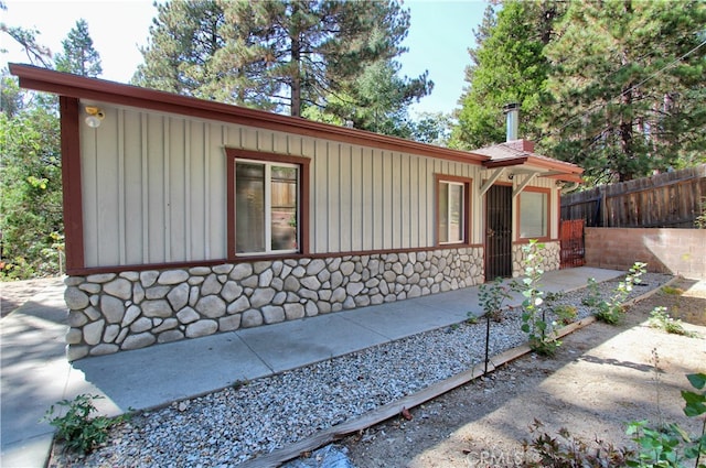 view of side of property featuring a patio