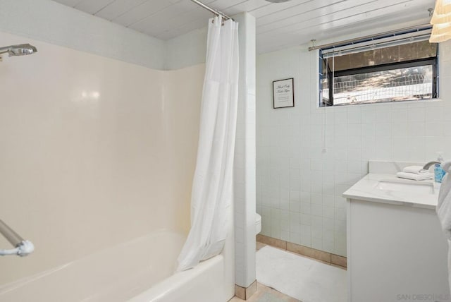 full bathroom featuring shower / tub combo with curtain, vanity, toilet, and tile patterned floors