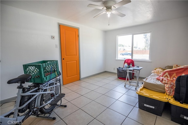 game room featuring ceiling fan and tile patterned flooring