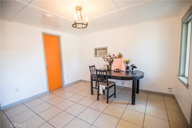 tiled home office with a notable chandelier