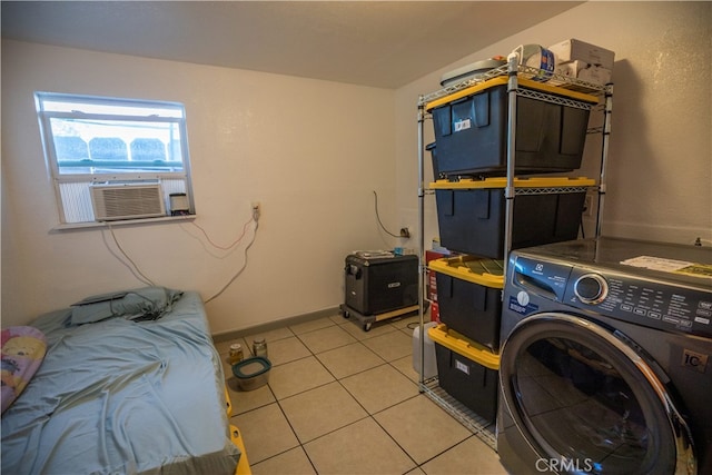 laundry room with cooling unit, washer / clothes dryer, and light tile patterned flooring