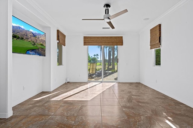 unfurnished room with ceiling fan and crown molding