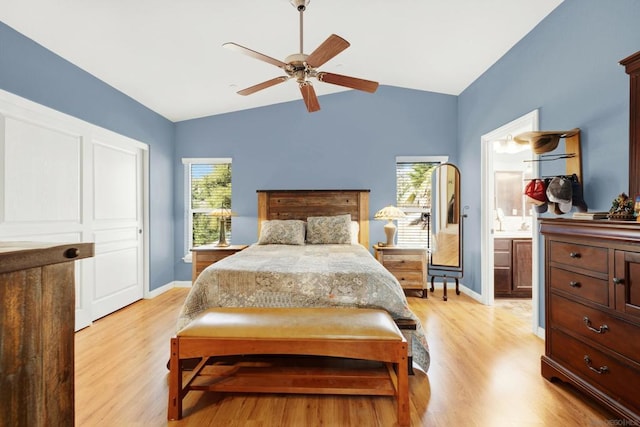 bedroom with lofted ceiling, light hardwood / wood-style flooring, and ceiling fan