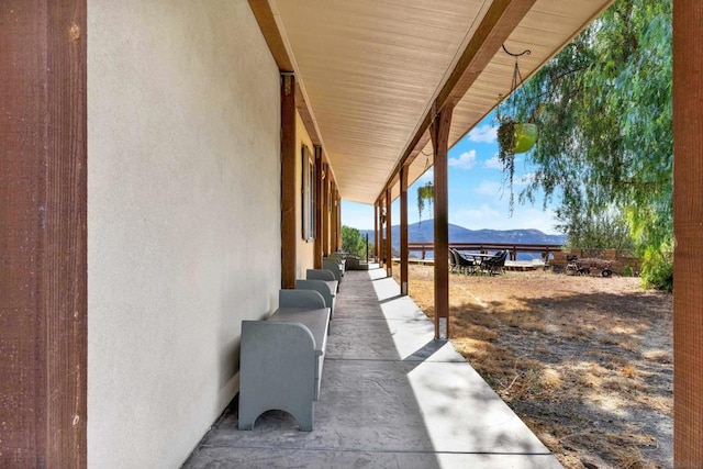 view of patio / terrace with a mountain view