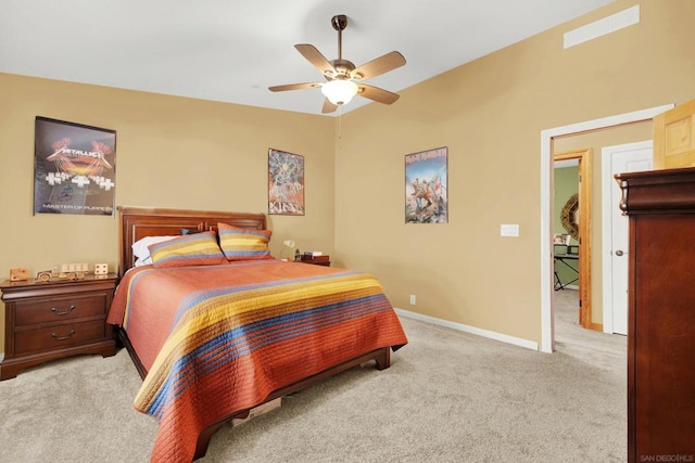 bedroom featuring light carpet and ceiling fan