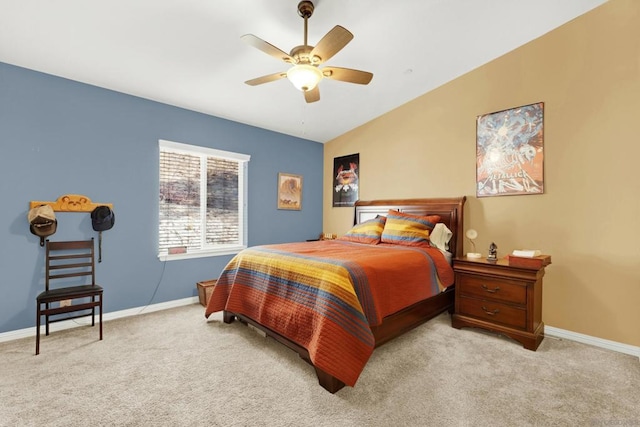 carpeted bedroom with lofted ceiling and ceiling fan