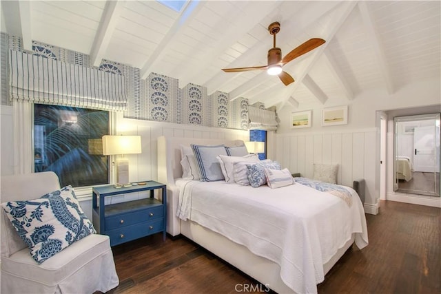 bedroom with lofted ceiling with beams, ceiling fan, and dark wood-type flooring