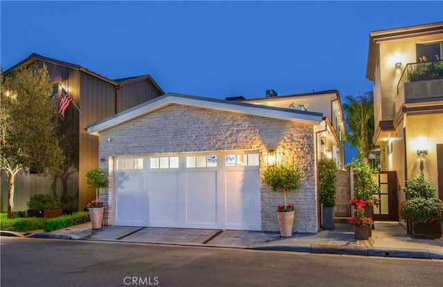 view of front of house with a garage