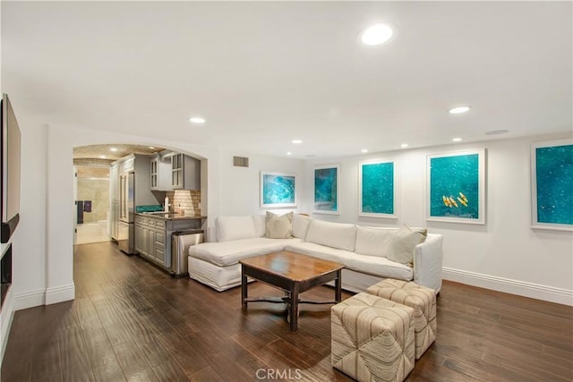 living room featuring dark hardwood / wood-style flooring