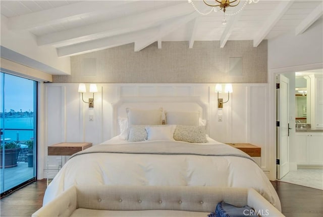 bedroom with lofted ceiling with beams, dark hardwood / wood-style flooring, access to outside, and ensuite bath