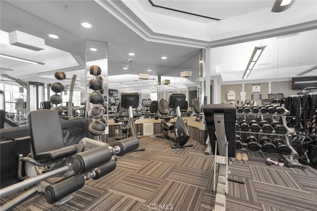 workout area with a wealth of natural light, carpet, and recessed lighting