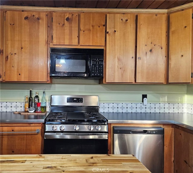 kitchen with appliances with stainless steel finishes and wooden ceiling