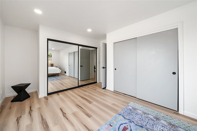 bedroom featuring light wood-type flooring