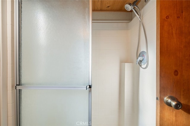 bathroom featuring an enclosed shower