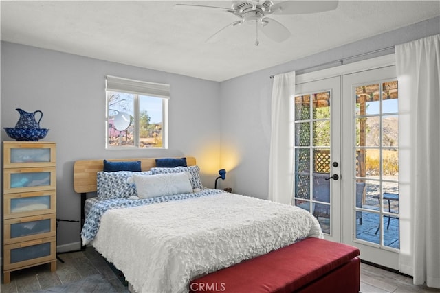 bedroom with french doors, ceiling fan, multiple windows, and access to outside