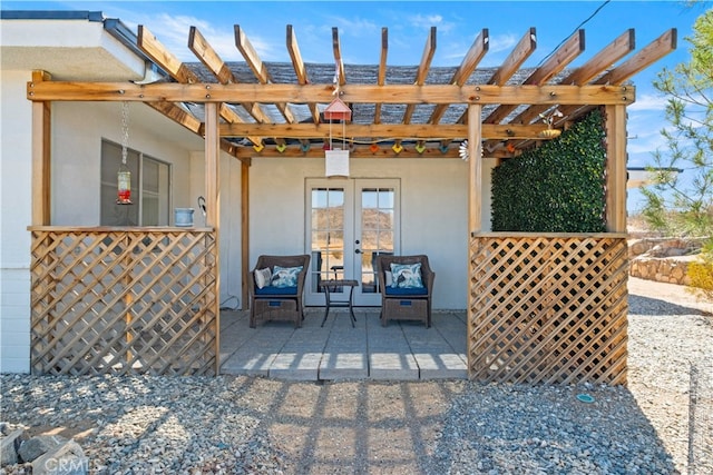 view of patio featuring french doors and a pergola