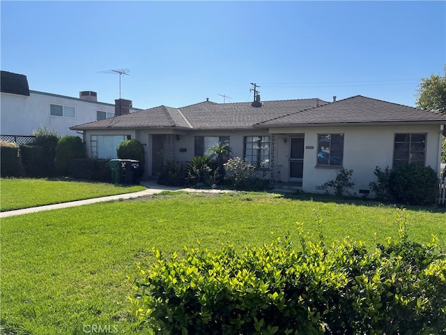 ranch-style house with a front yard