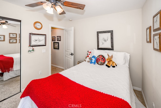 carpeted bedroom featuring ceiling fan