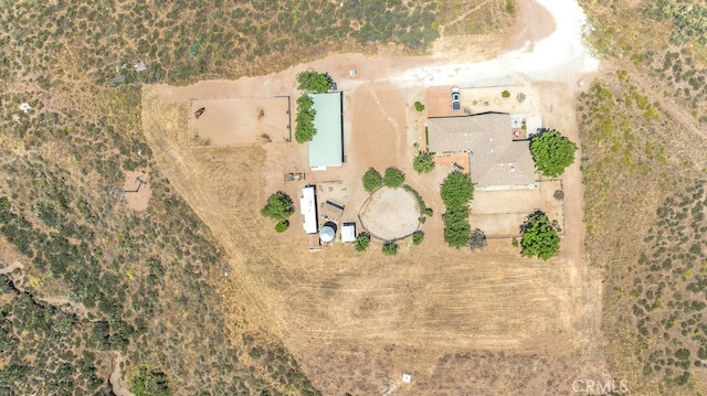 birds eye view of property featuring a rural view