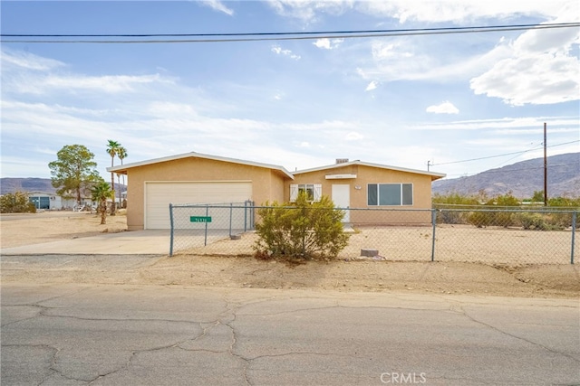 view of front of property with a mountain view