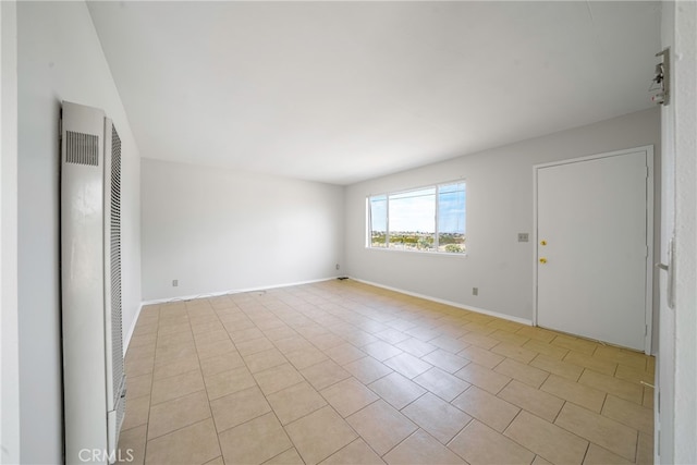 view of tiled spare room