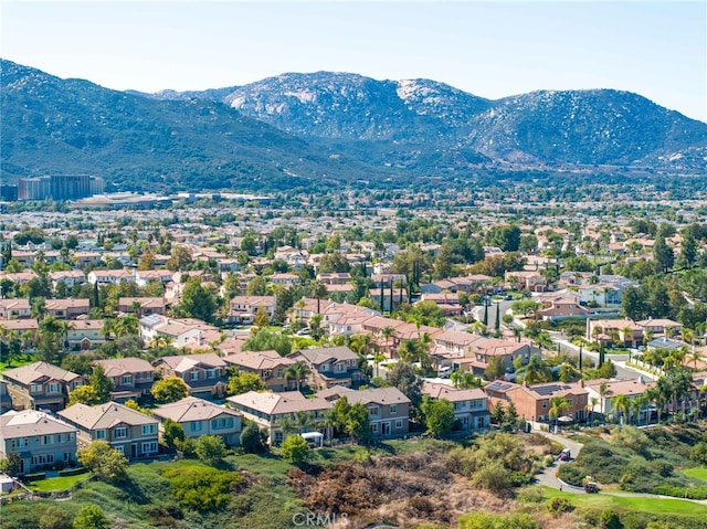 drone / aerial view featuring a mountain view