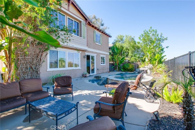 view of patio / terrace with a fenced in pool