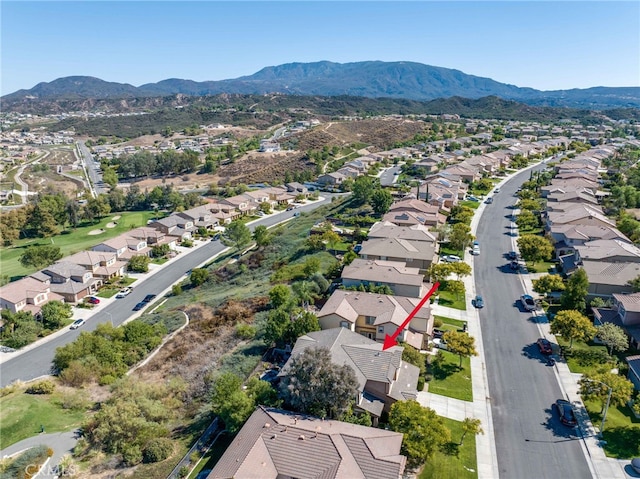 drone / aerial view featuring a mountain view