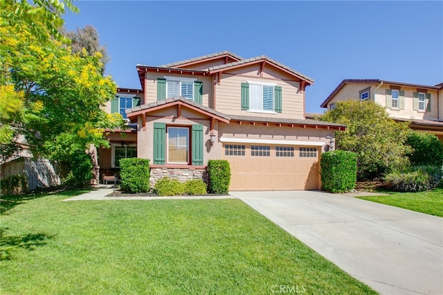 craftsman-style house featuring a front lawn and a garage