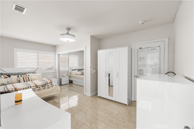 bedroom featuring ceiling fan