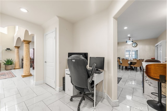 office space featuring ornate columns