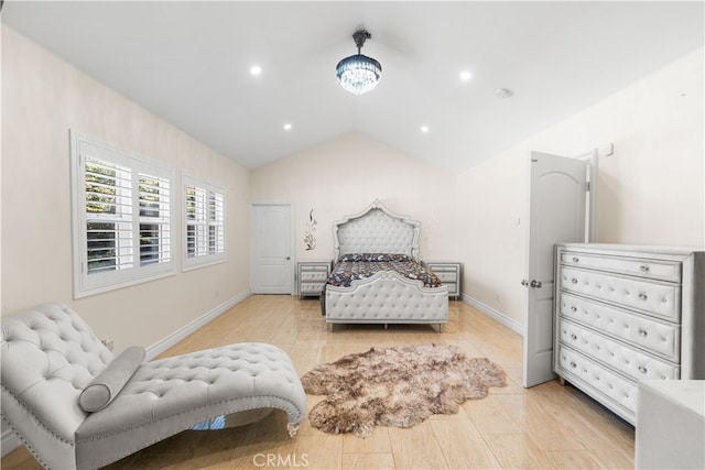 bedroom with vaulted ceiling