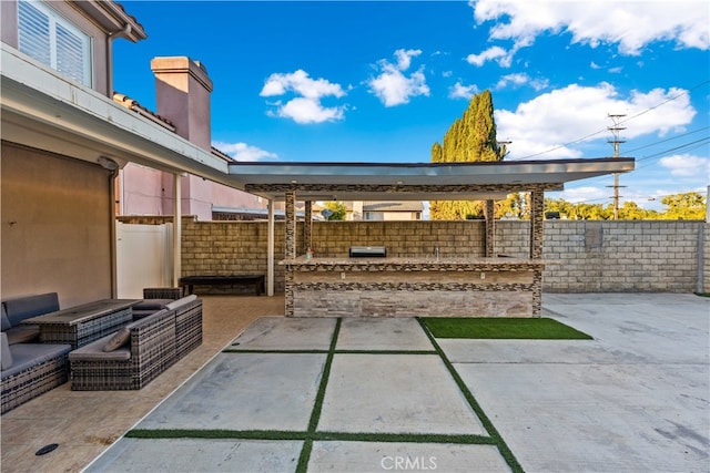 view of patio with exterior kitchen