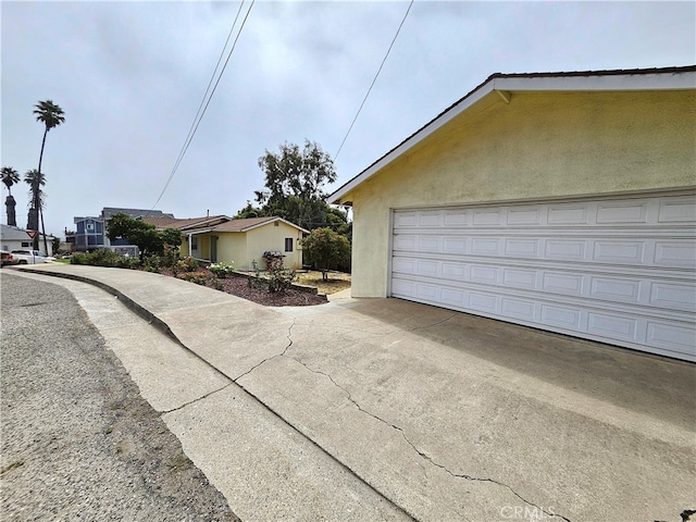 exterior space with a garage