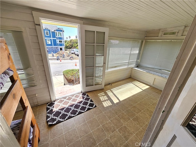 doorway featuring wooden ceiling