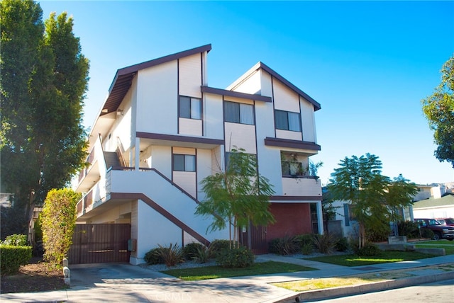 view of front of home with a balcony