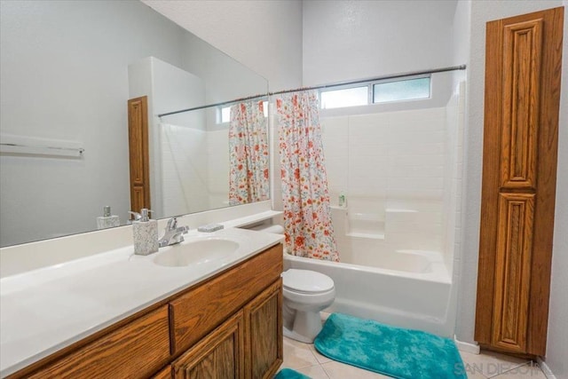 full bathroom featuring vanity, shower / tub combo, toilet, and tile patterned flooring